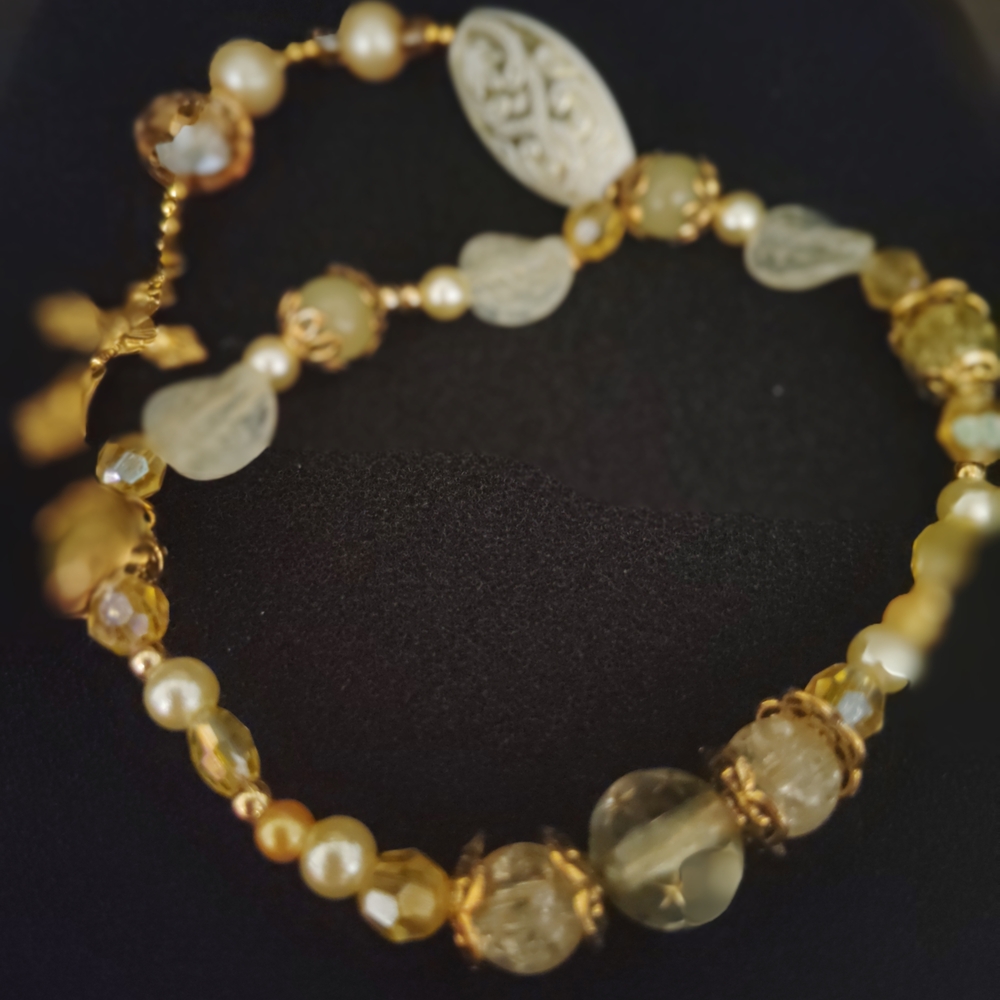 Elegant Gold and Cream Beaded Necklace